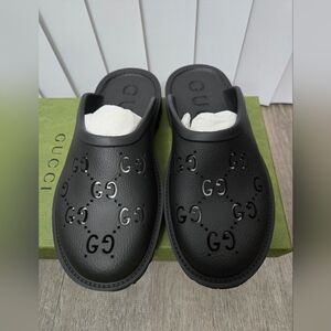 NWOT Womens Gucci Cut Out Monogram Black rubber Slip-ons